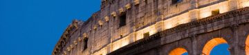 Light shines through openings of Rome's ancient coliseum