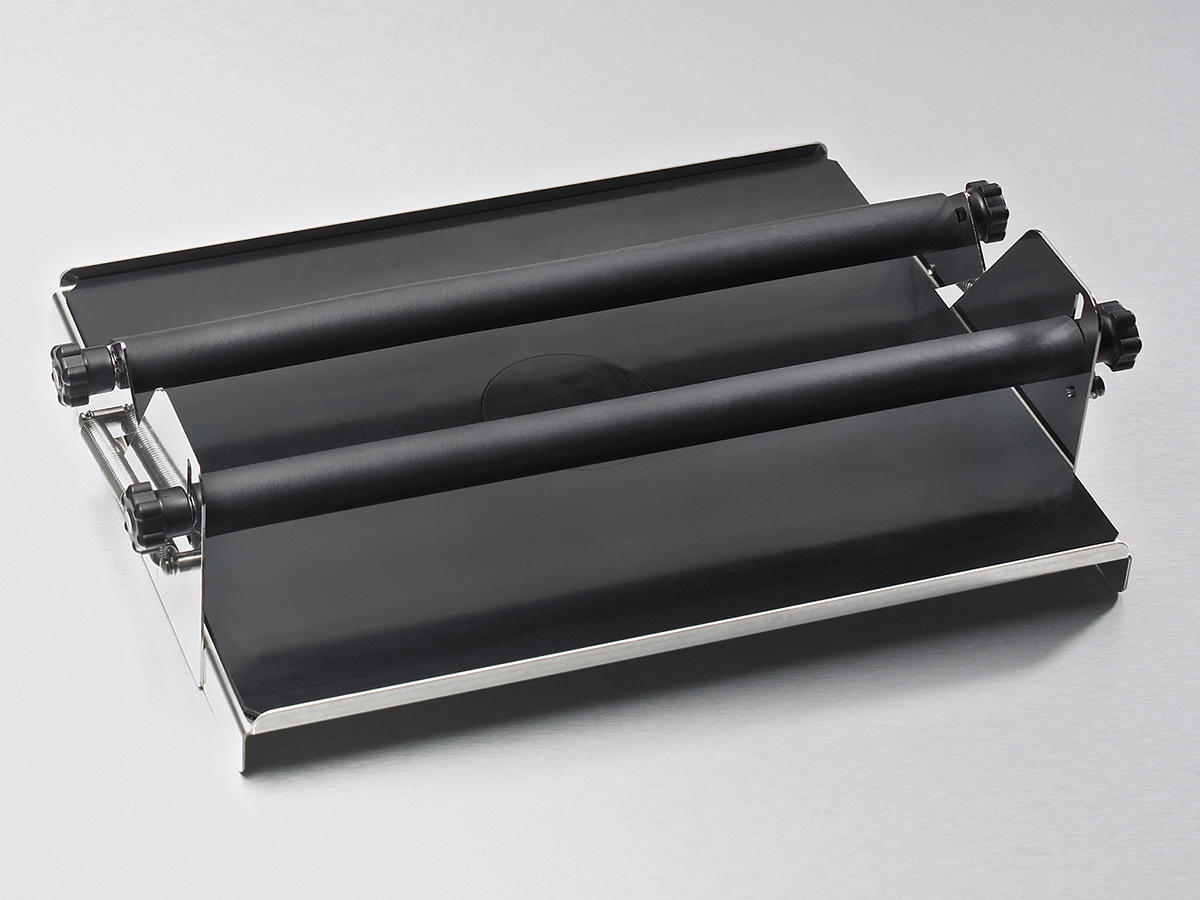 Spring loaded platform for flasks, bottles and tube racks