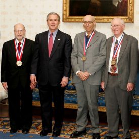 Dr. Irwin Lachman, Dr. Rodney Bagley, Ronald Lewis, President of the United States George W. Bush