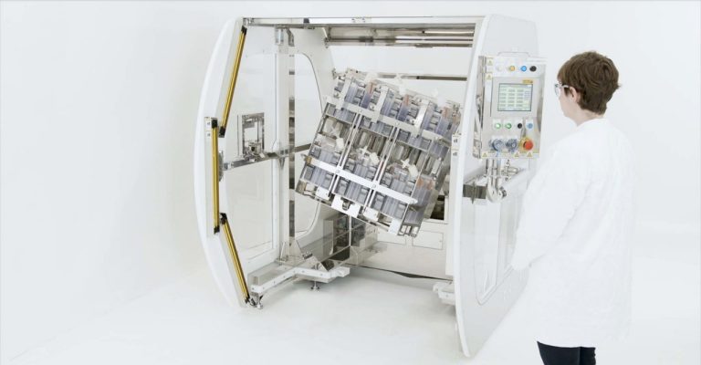 Scientist operates Corning® Automated Manipulator Platform
