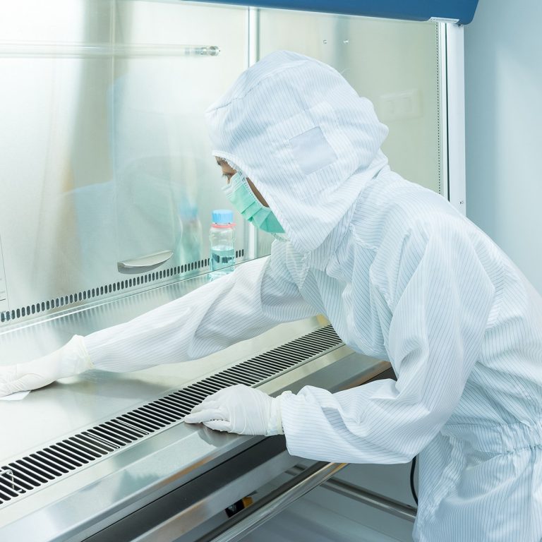 Scientist Cleaning Lab