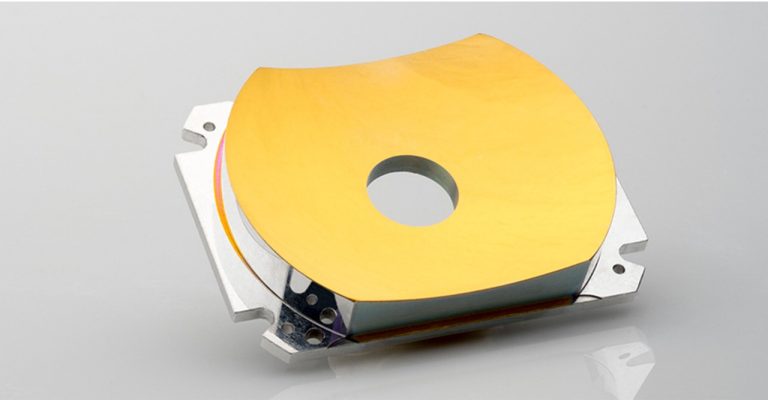 Metallic diamond-turned aluminum optic.