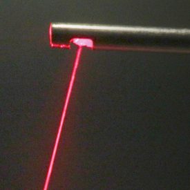 Fiber optic probe emits thin, red beam of light