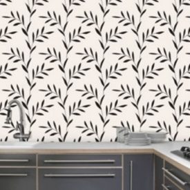 Glass laminate in brown fern pattern covers kitchen walls