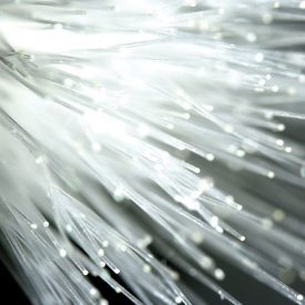 Myriad tips of brightly lit clear glass fiber