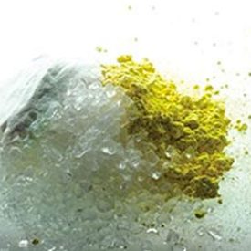 Clear silica with gray, yellow compounds that make up glass