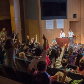 Corning scientists lead chemical magic show.