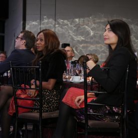Attendees at the event listen to Weeks' speech.