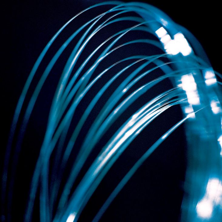 Closeup of loops of thin, blue fiber