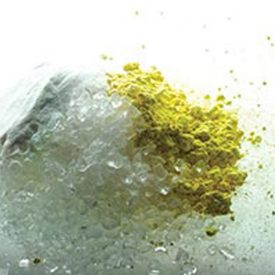 Clear silica with gray, yellow compounds that make up glass