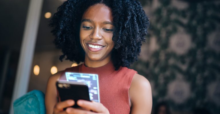 woman holding cellphone