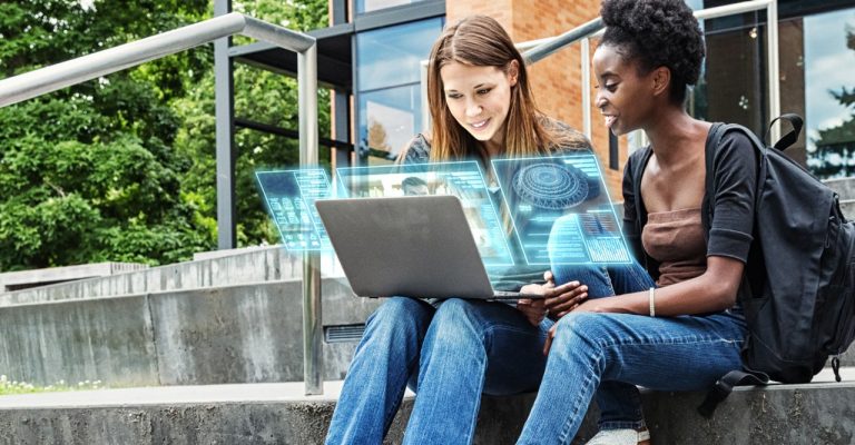 two students looking at a computer