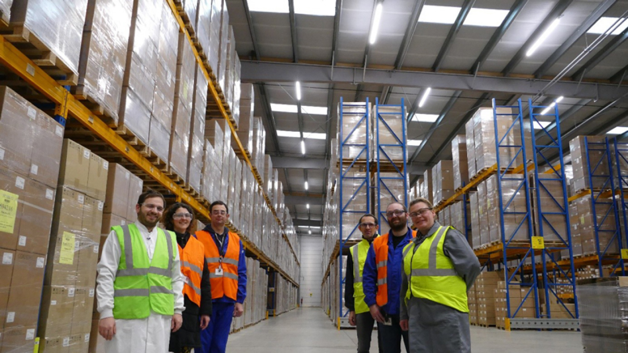 Employees in France show off their energy-efficient LED lighting.