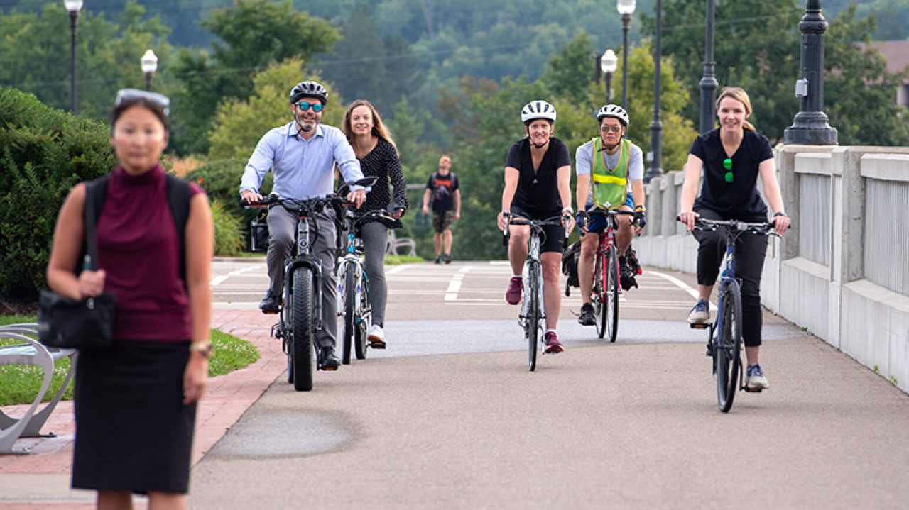 Corning Sustainability Network members bike to work and log their trips on the Corning Green Commuter App, which tracks their greenhouse gas emissions saved.