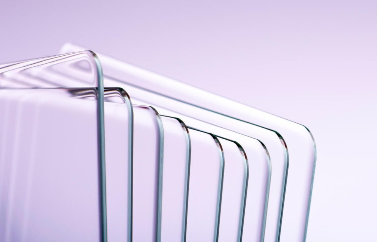 Eight stacked sheets of ceramic cover material stylistically set on a purple abstract background.