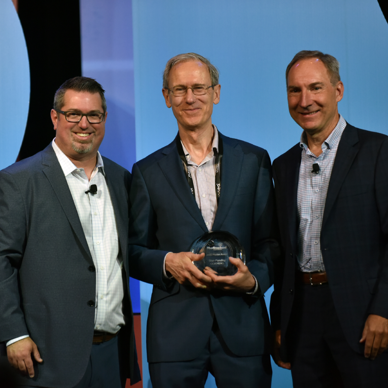Stan Fendley accepts his 2022 Photon Award from the Fiber Broadband Association.